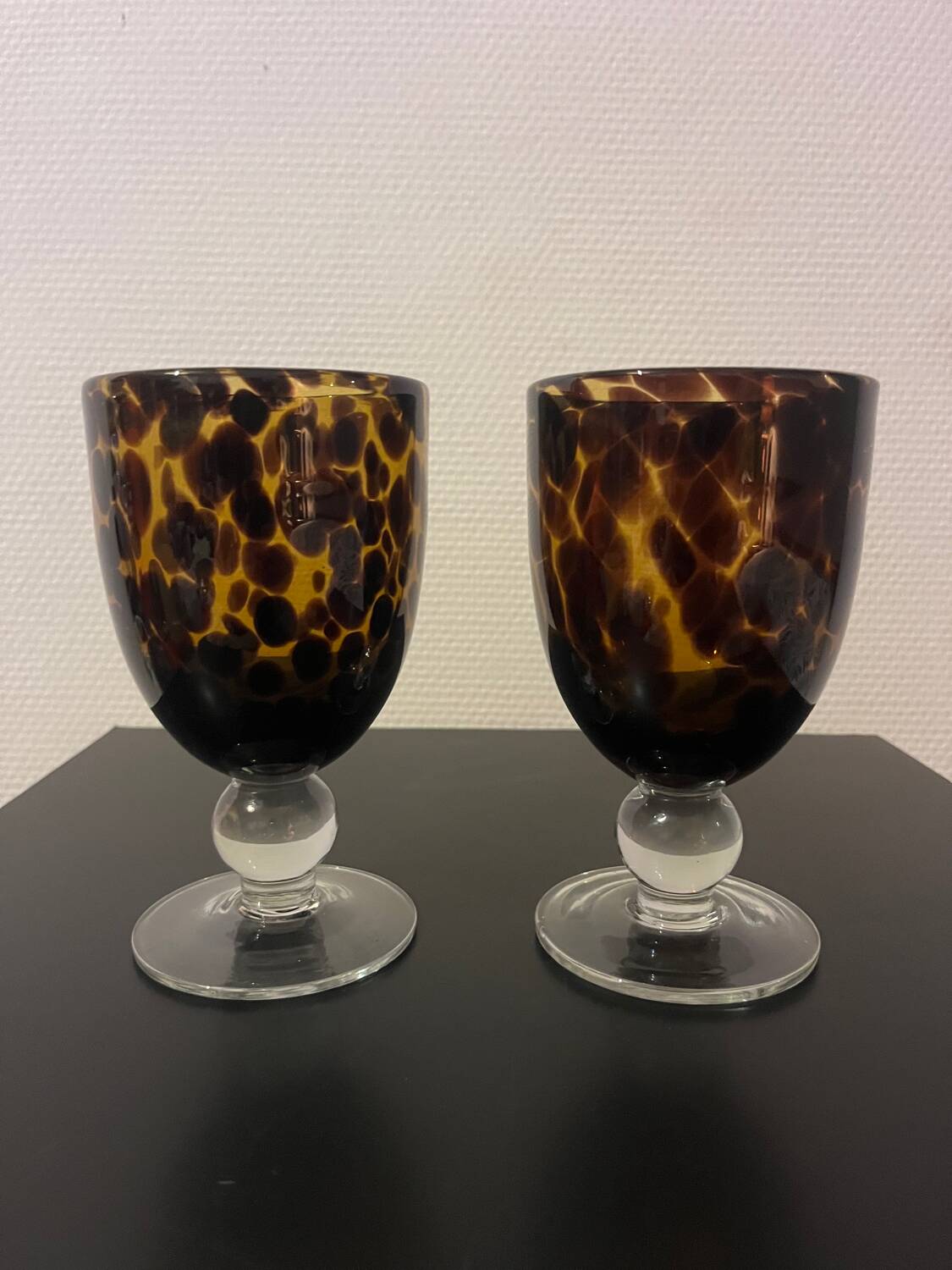 Duo of amber glass stemware