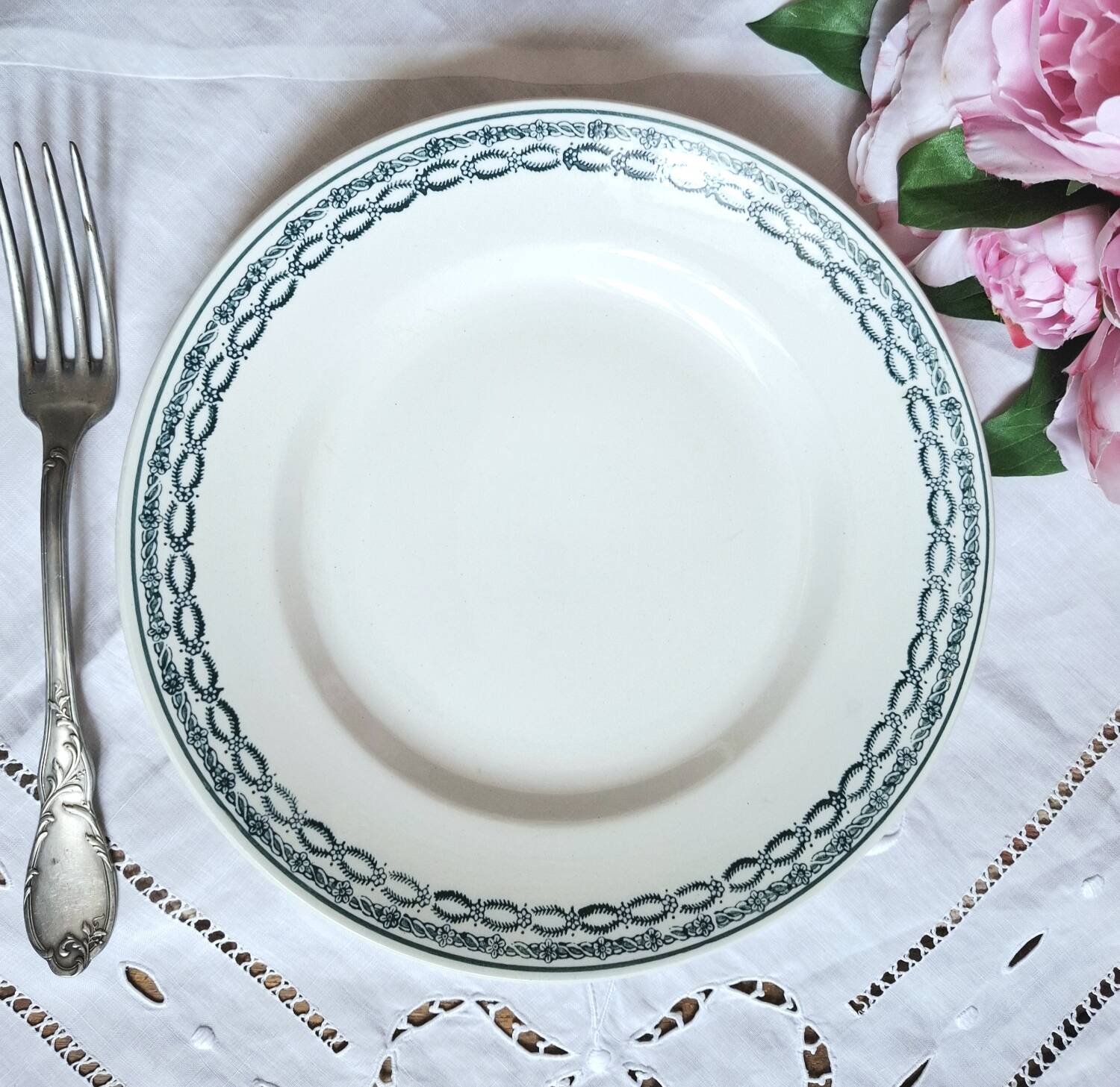 Mismatched antique flat plates made of ironstone accompanied by