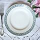 Mismatched antique flat plates made of ironstone accompanied by