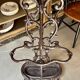 Coat rack with 6 hooks and cast iron brown umbrella stand.