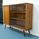 Console with sliding doors