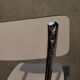 3 white Formica chairs