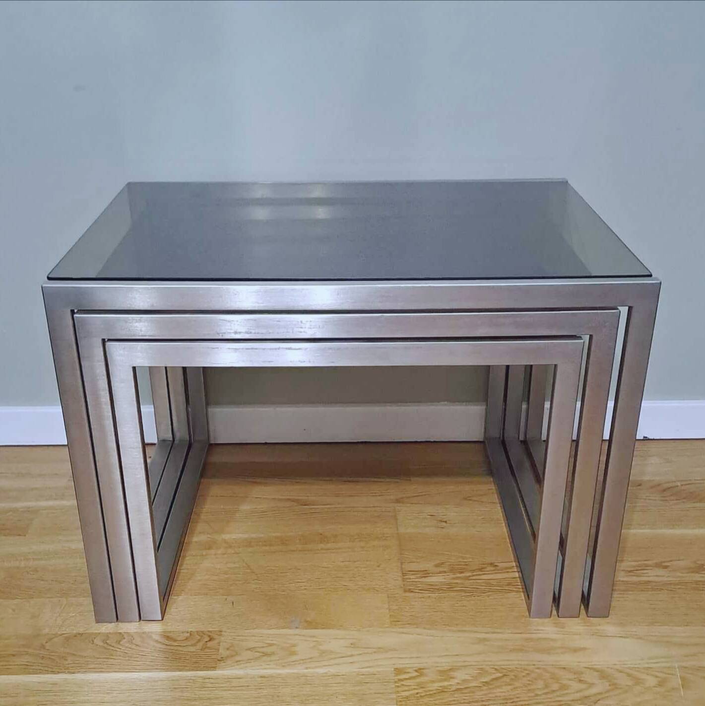 Chrome and smoked glass designer nesting table