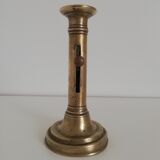 Vintage push candle holder