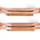 Pair of oak and copper bronze candlesticks