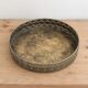 Round metal plate in patinated gold with an openwork border – D30 cm