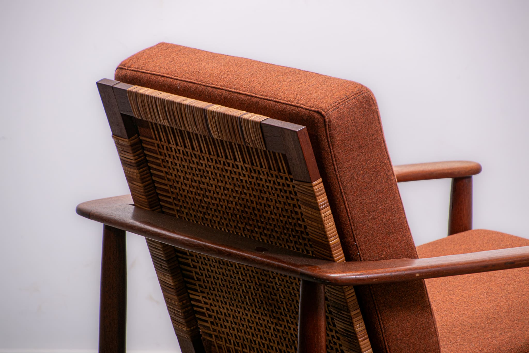 Mid-century easy chair in teak and cane circa 1970