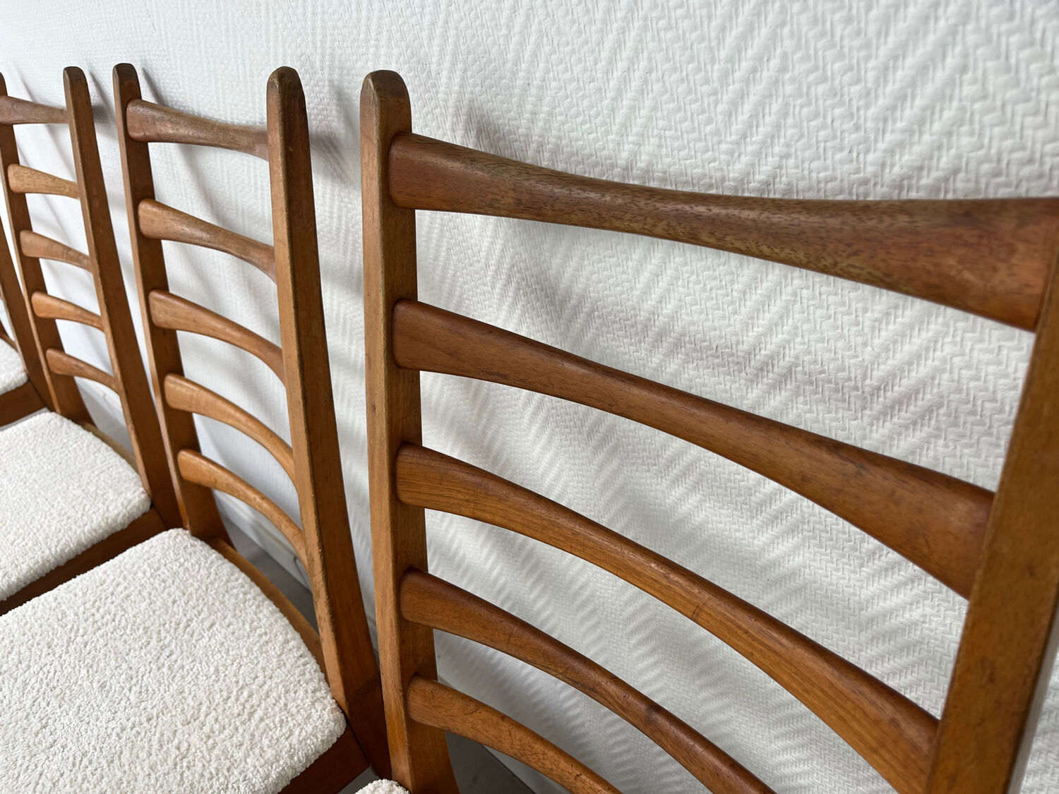 4 Scandinavian chairs, teak with boucle seats.