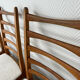 4 Scandinavian chairs, teak with boucle seats.