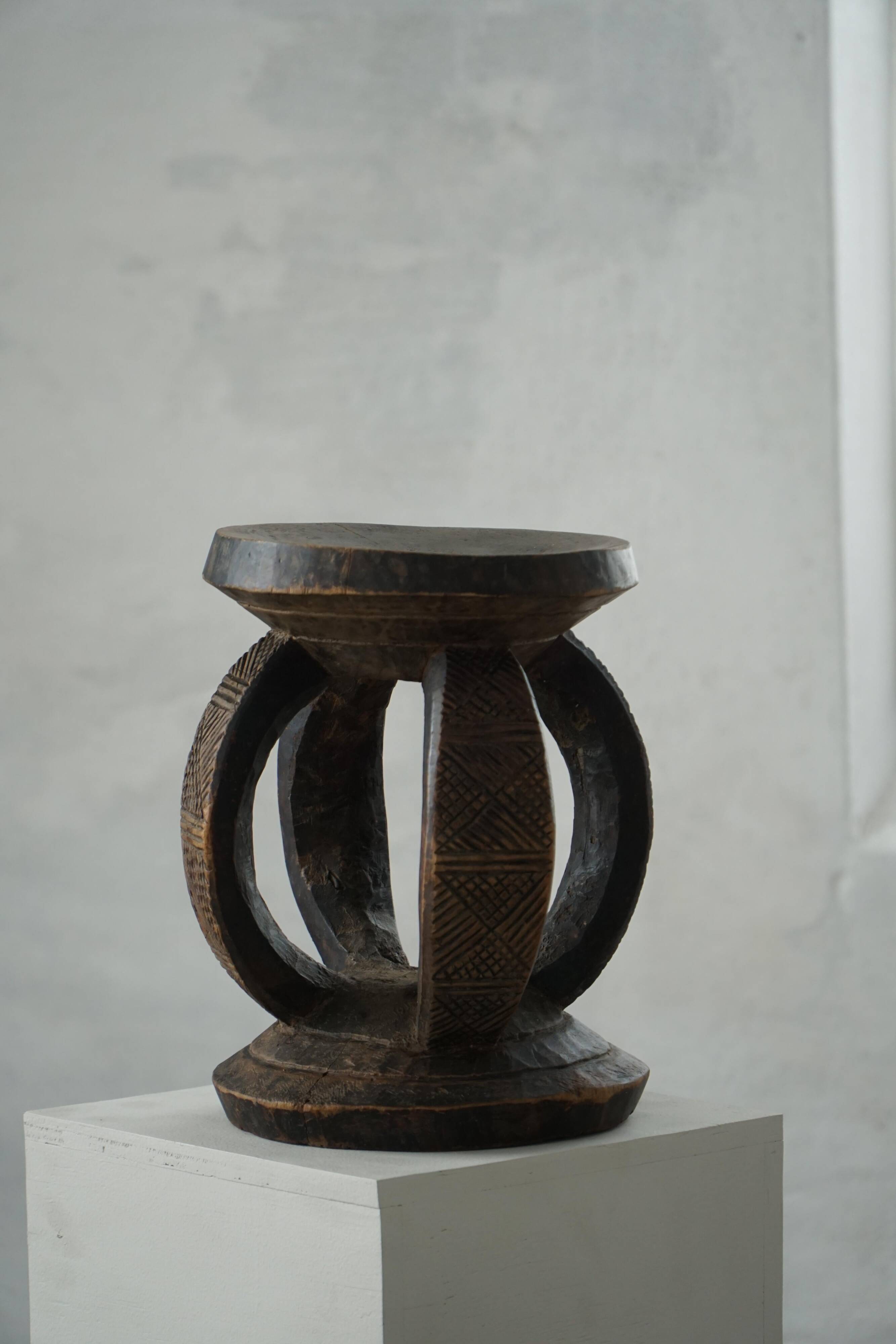 African Dogon stool from the mid-20th century, hand-carved in wood, Wabi-Sabi style.
