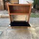 Brown trapezoidal wooden bar cabinet from the 1960s with a niche and lockable flap.