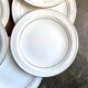 12 Corning dinner plates in white and gold porcelain