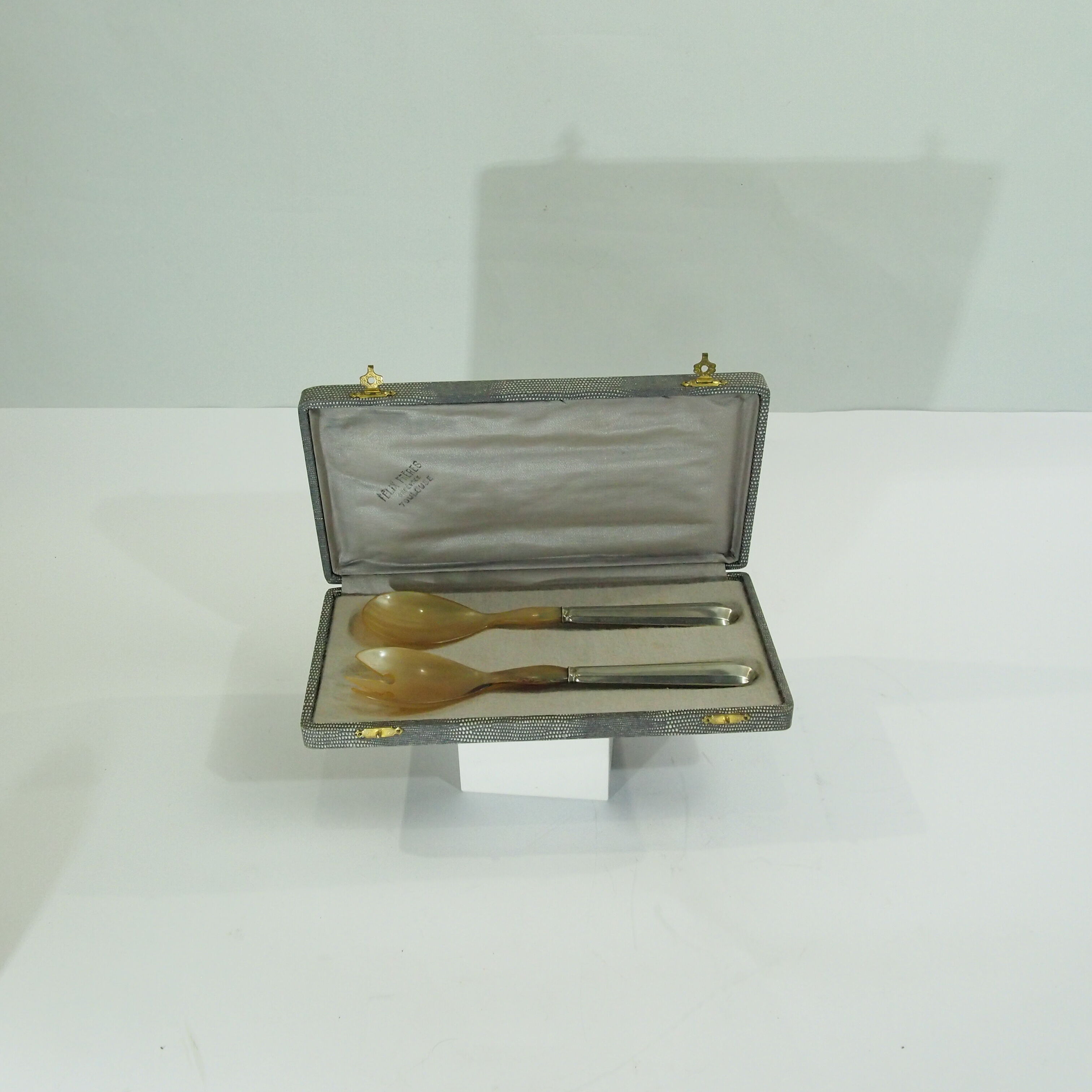 Bone and metal filled salad servers