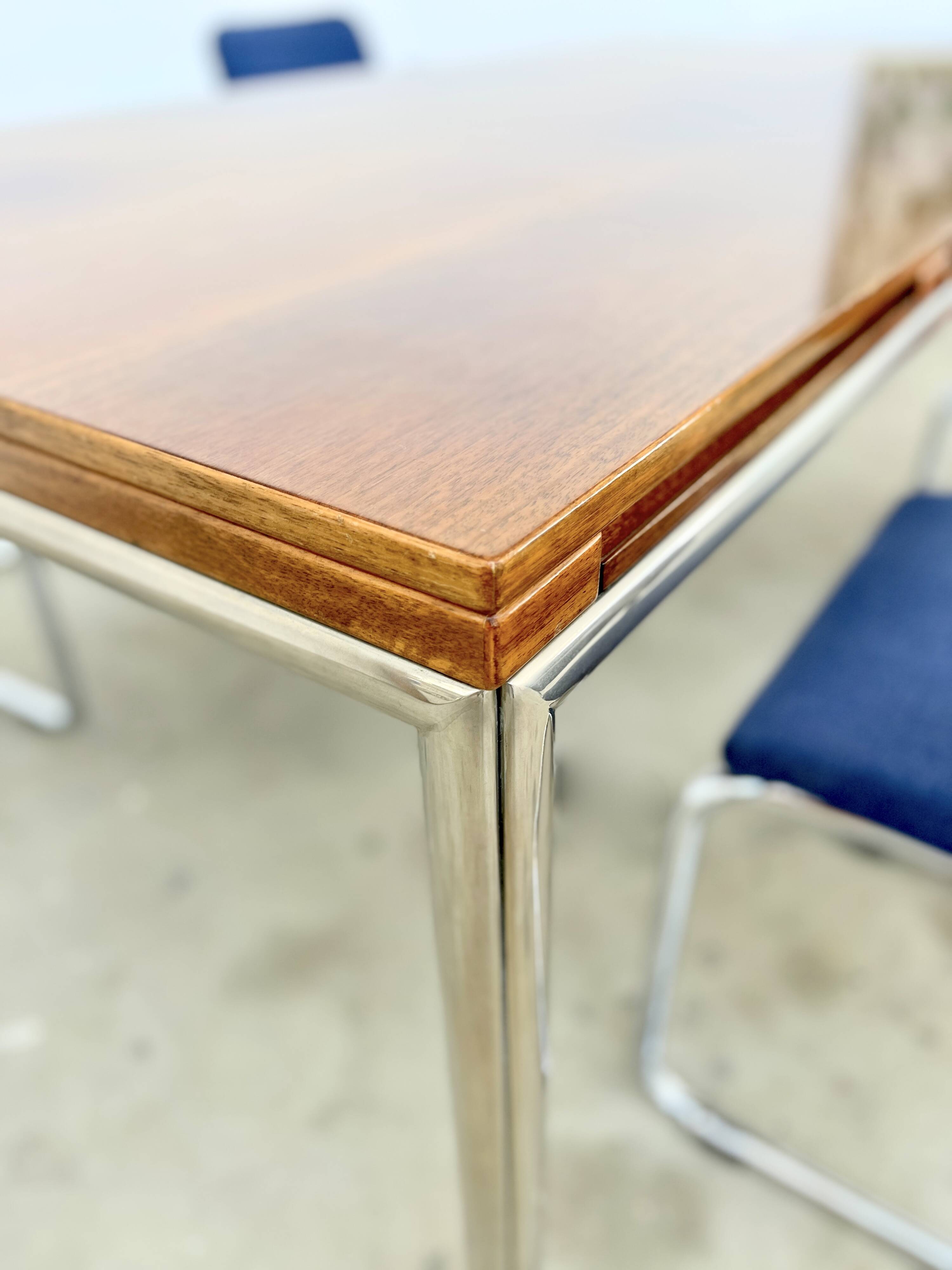 Italian walnut and chrome dining table with 4 drawers