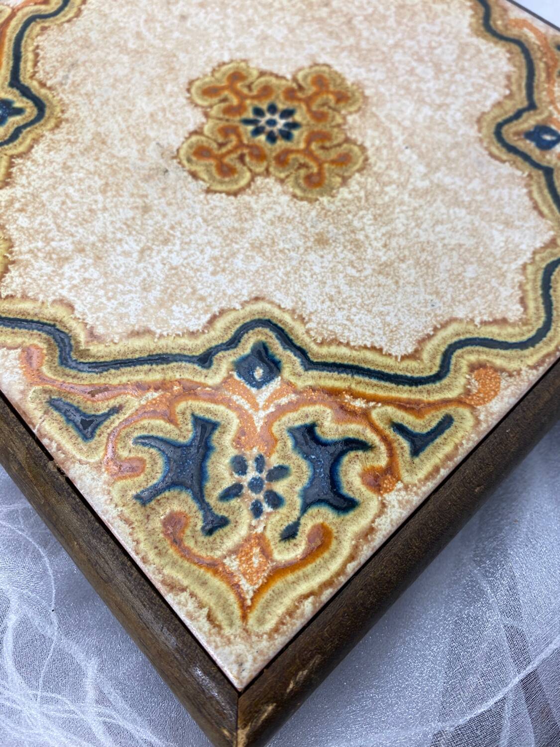 Ceramic and wood trivet