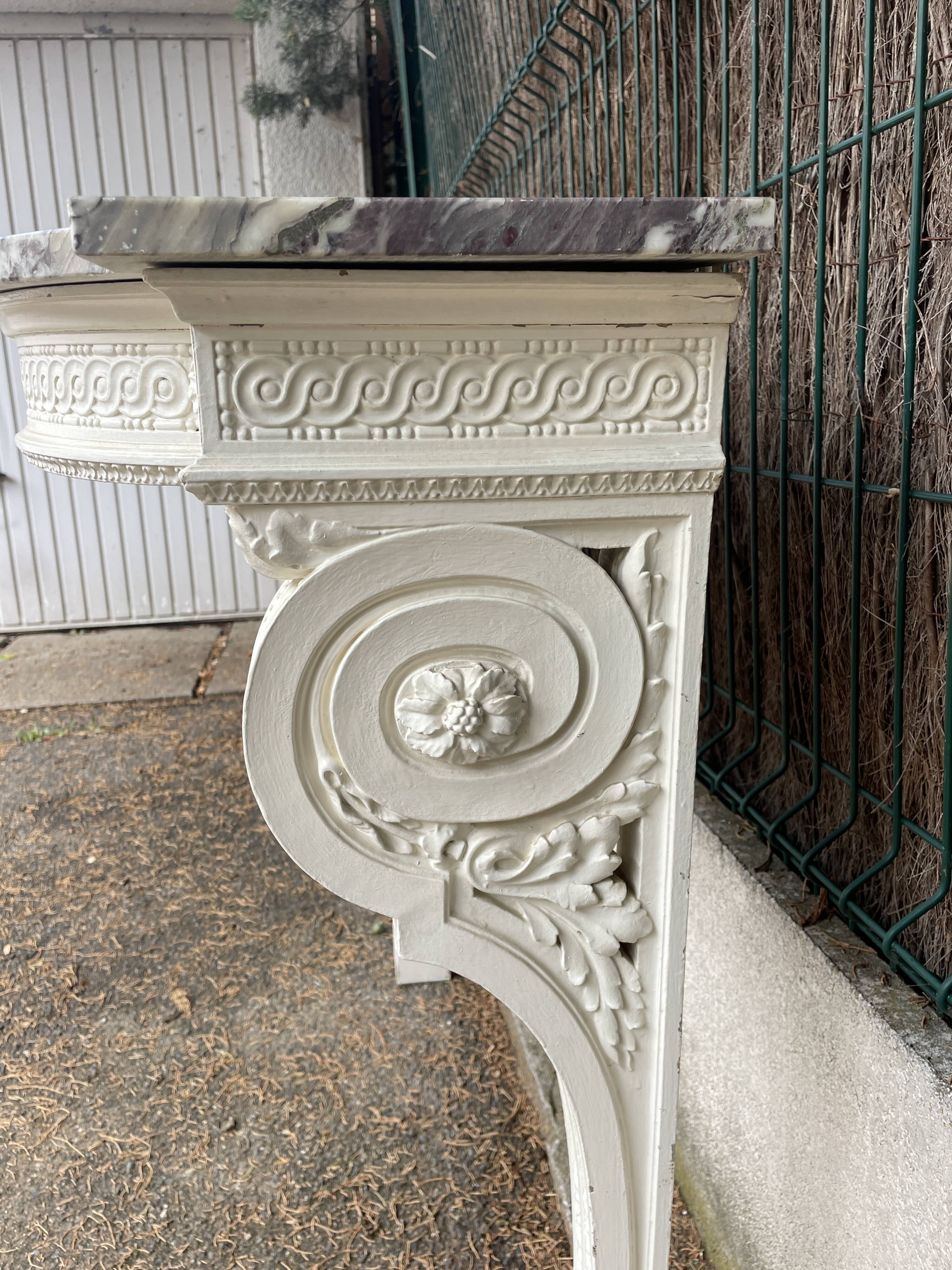 Painted wooden wall console with doe legs and interlacing. Louis XVI. Peach blossom marble