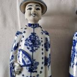 Pair of vintage Chinese blue and white porcelain figurines depicting