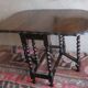 Farmhouse patinated extendable dining table in oak with carved edge, 1900