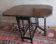 Farmhouse patinated extendable dining table in oak with carved edge, 1900