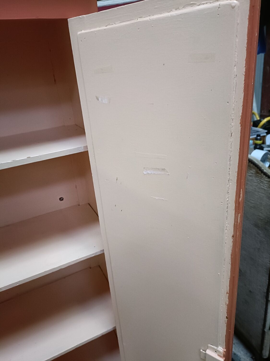 Vintage two-door cabinet with shelves