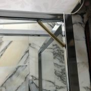 Nested tables in chrome metal and glass, Italy circa 1970.