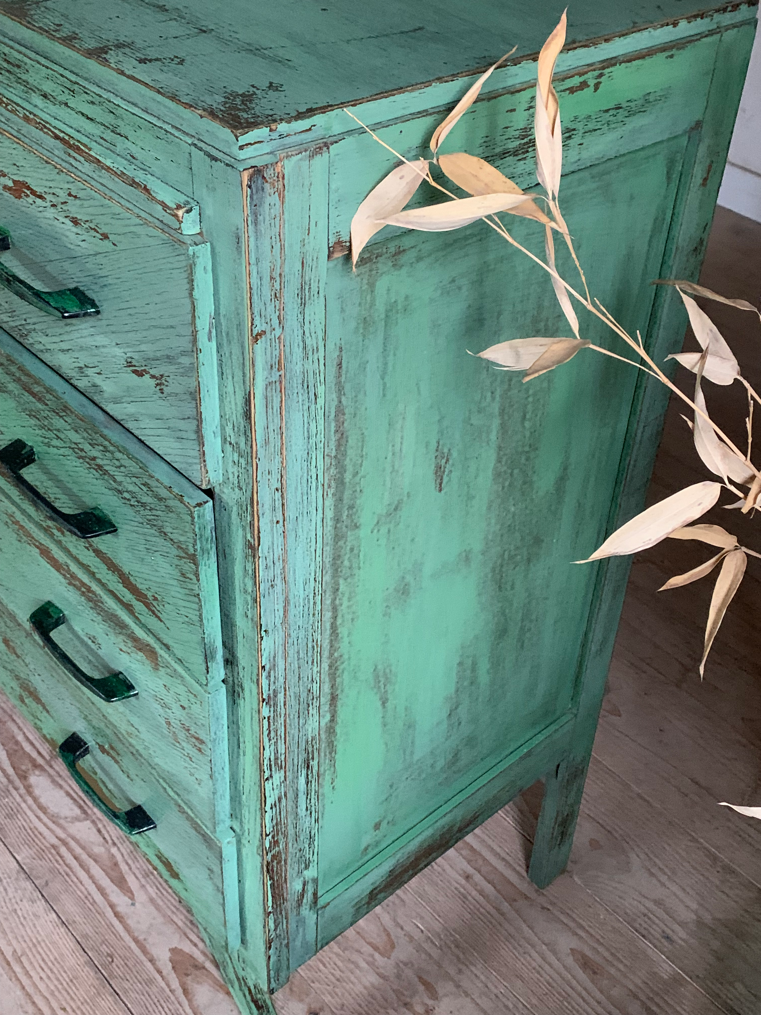 Vintage compass leg commode with a patina.