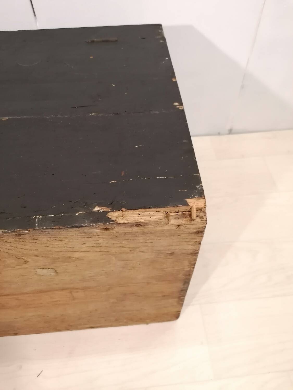 Large travel trunk in blackened wood