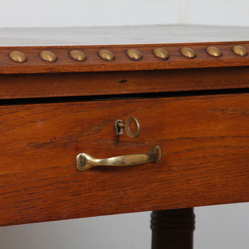 Oak and brass desk in the style of Charles Dudouyt, 1940.