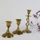 Trio of brass candle holders, vintage
