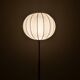 Mid-century floor lamp in brass and oak by Falkenbergs Belysning, Sweden, 1960s.