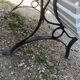 Antique garden bench with cast iron legs