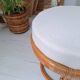 Rattan and terry fabric pouf