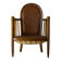 Antique armchair in solid wood and patinated brown leather, early 20th century.