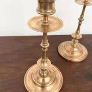 Pair of antique turned rose brass candlesticks (24 cm)