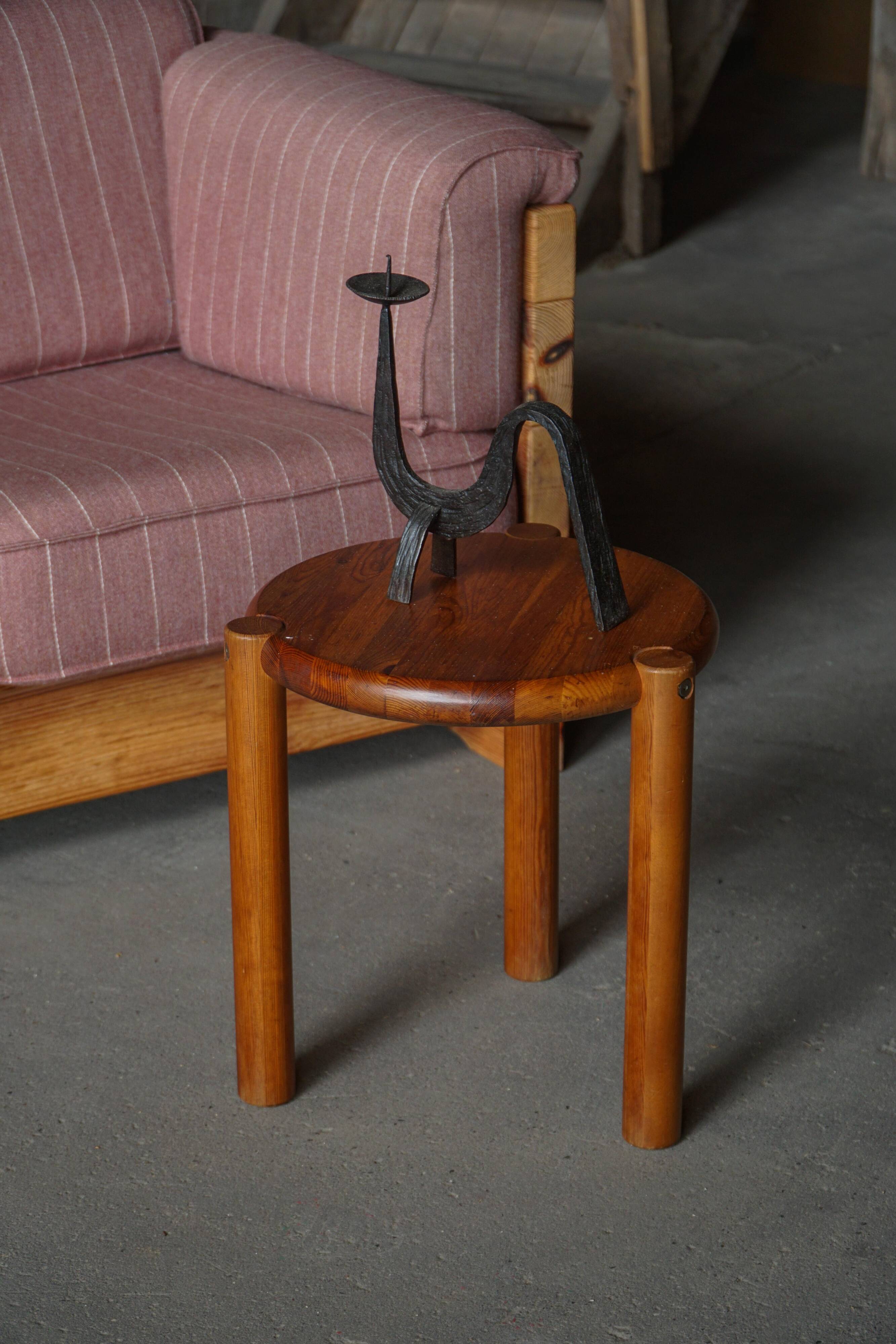 Modern Scandinavian tripod stool from the 20th century with a circular seat, 1970s.