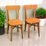 Paire de chaises bistrot caramel 1950