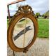 Miroir ovale en bois et stuc doré 19ème