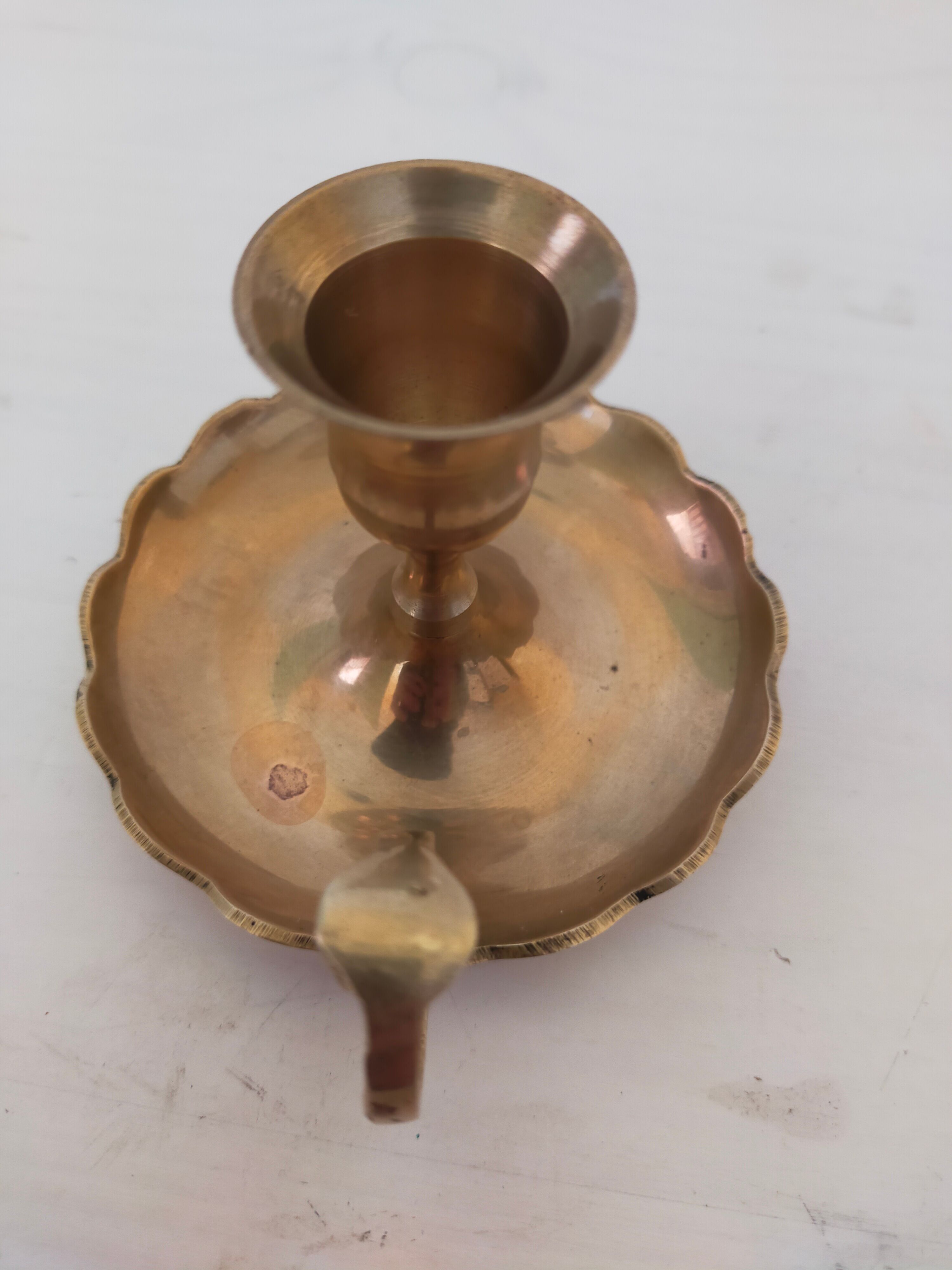 Brass handheld candle holder
