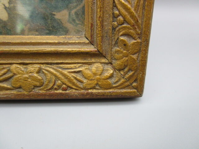 Old frame in worked wood