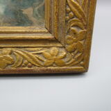 Old frame in worked wood