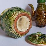 Set of old teapots and honey pot