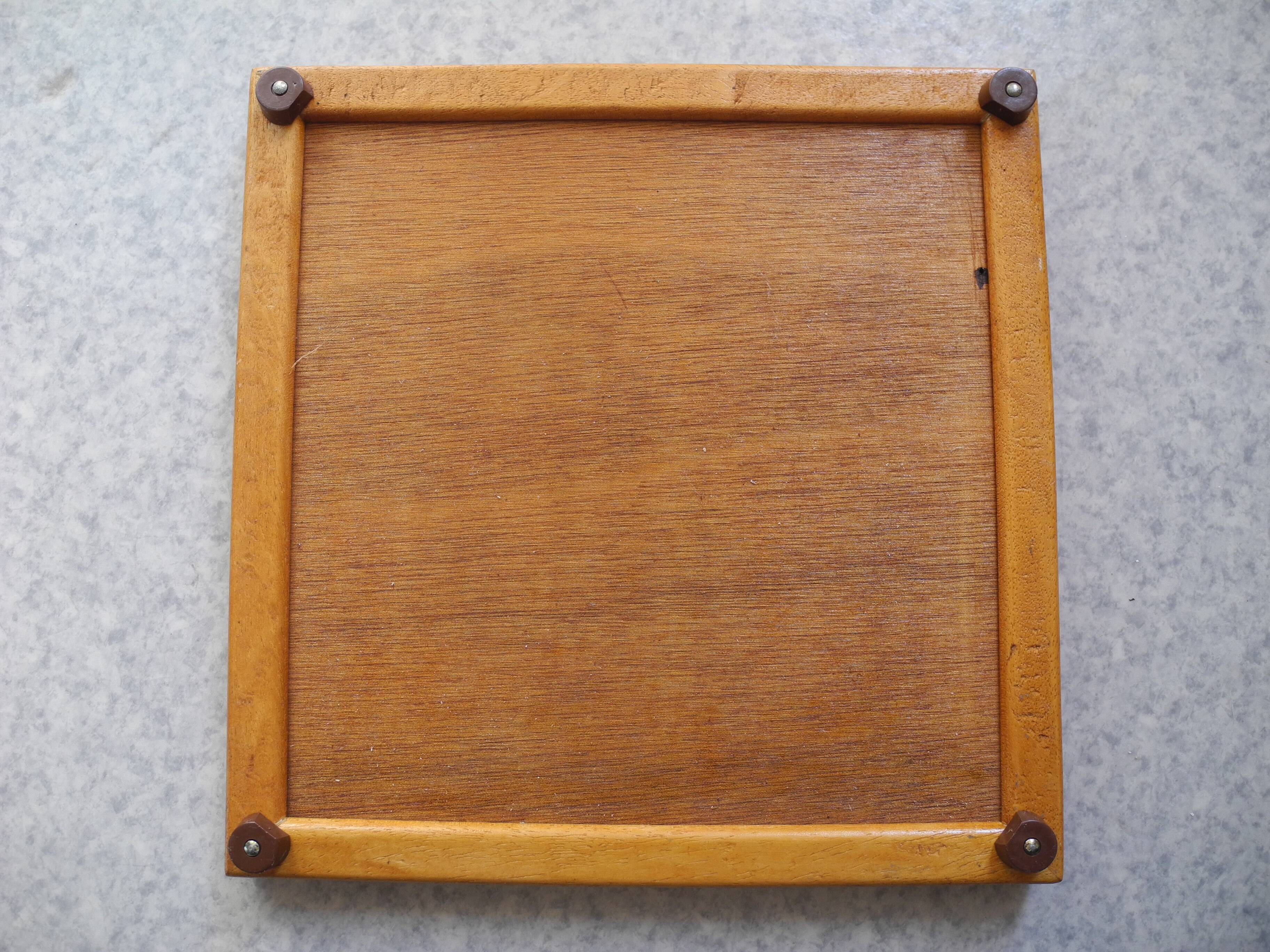 old orange earthenware trivet vintage decor art table 70s