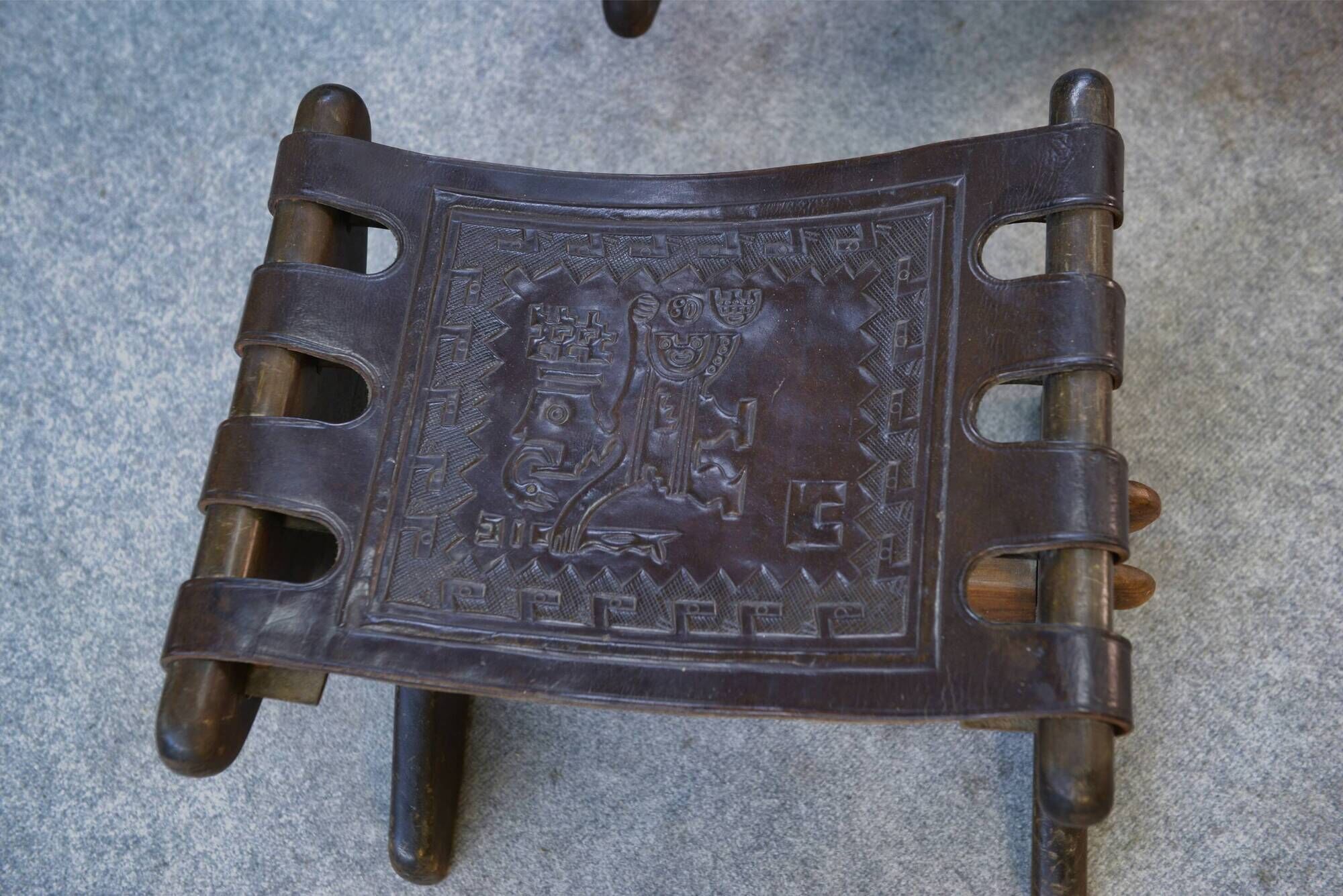 Armchair with ottoman by Angel Pazmino in brown wood and leather from the 1960s.