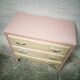Vintage wooden and pink chest of drawers
