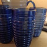 Orangeade carafe service and 6 glasses in a wicker basket