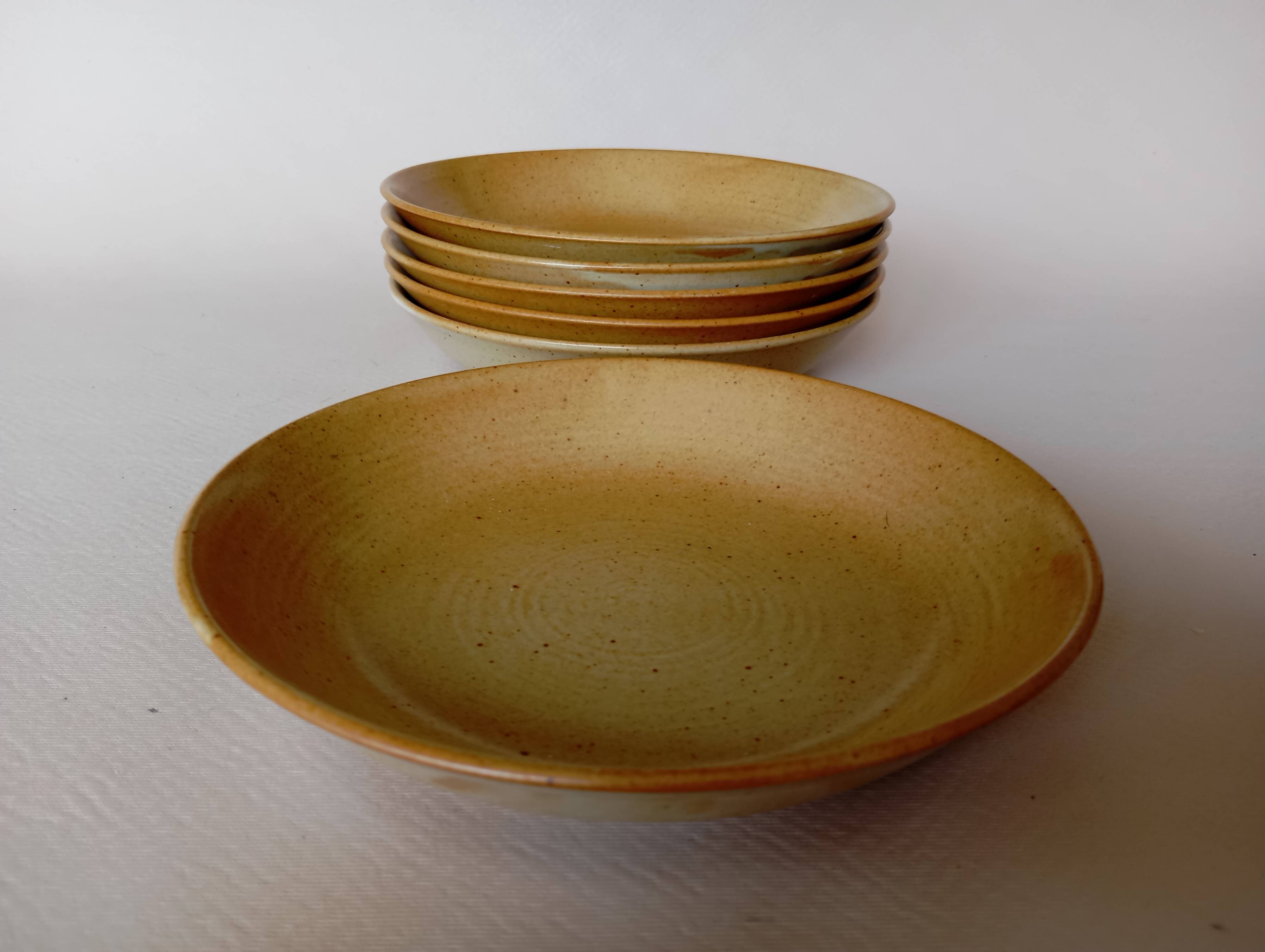 6 CNP Village stoneware skullcap plates