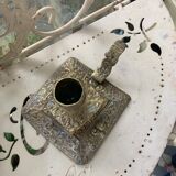 Cellar rat candlestick in gilded brass chised flower pattern, foliage and old face