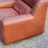 Pair of armchairs and De Sede sofa in cognac leather from the 70s/80s