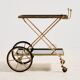 Brass-framed dessert trolley by Maison Jansen, France.