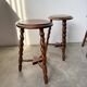 Set of 4 turned oak stools.